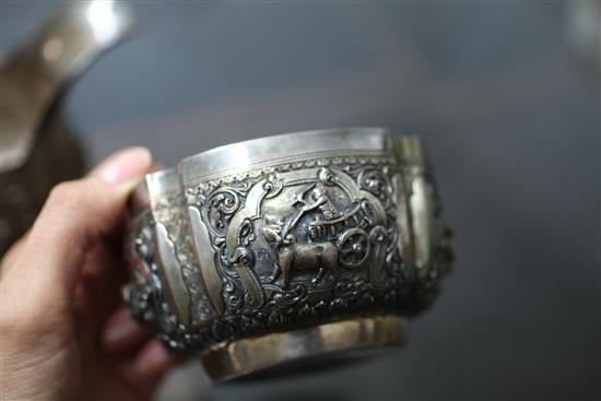 A heavy late 19th century Indian three piece silver tea set,